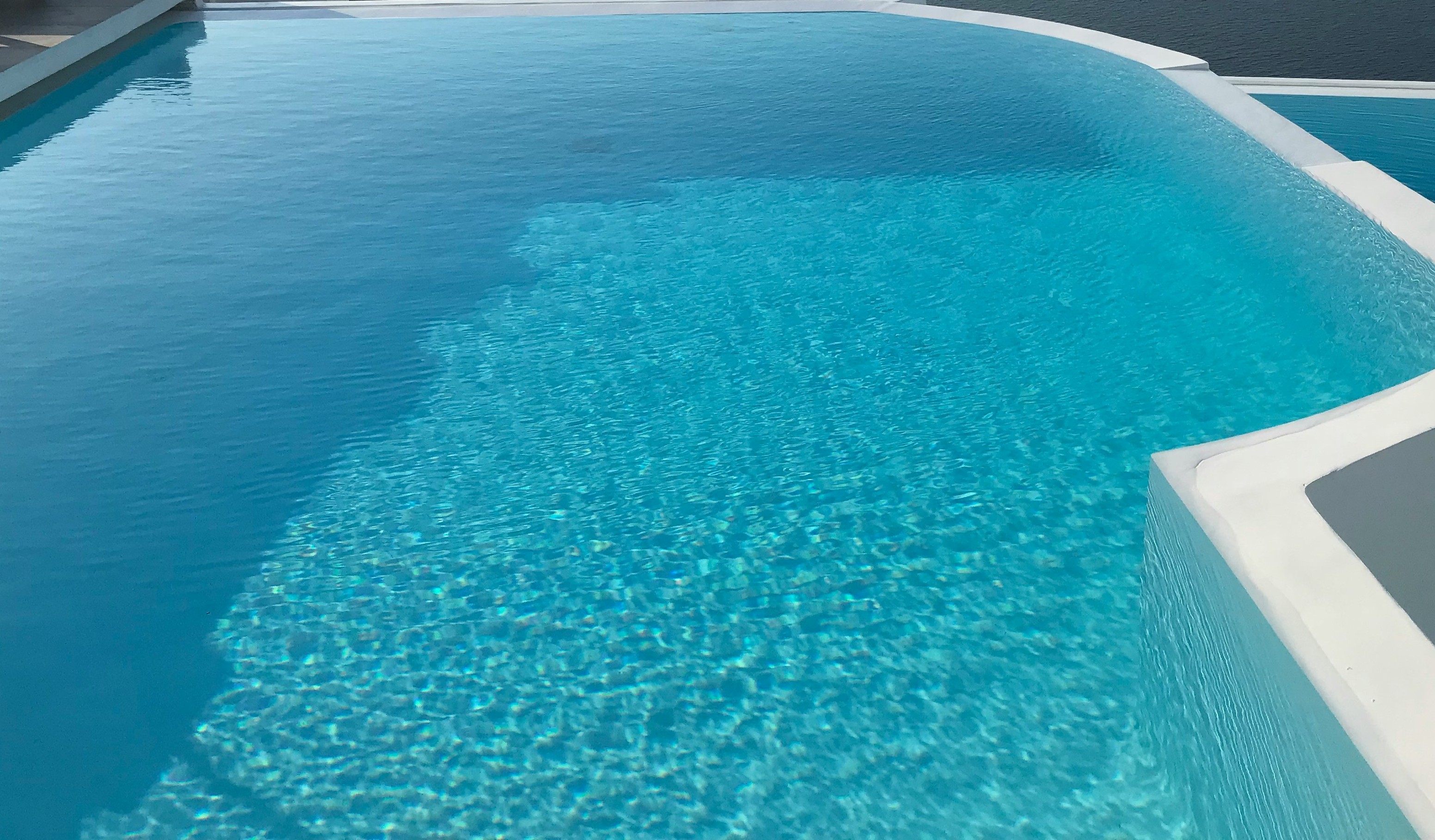 Infinity pool overlooking city